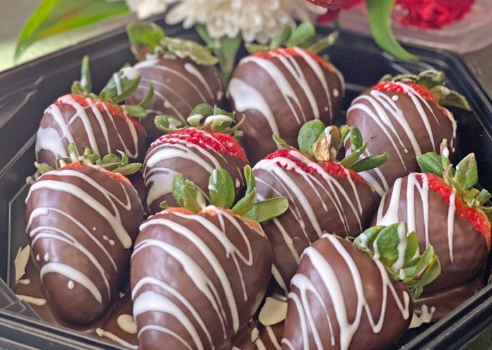 chocolate dipped strawberries on a plate