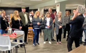 Timberland Regional Library Executive Director Cheryl Heywood (right) addresses a crowd at the grand re-opening of the Shelton Timberland Library