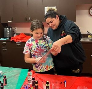 two  girls at an activtiy table at Hands On Children's Museum