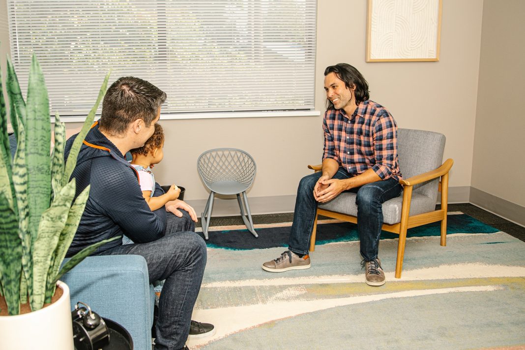 a mental health professional talking with someone