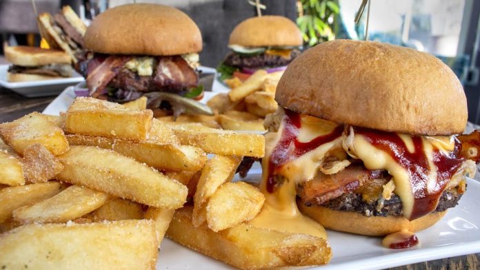 Uptown Lounge's gourmet burgers with fries