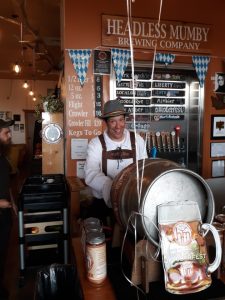 Headless Mumby owner Alex Maffeo greets customers during Oktoberfest with his usual cheeky smile. 