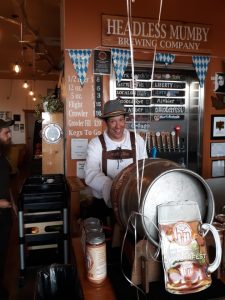 Headless Mumby owner Alex Maffeo greets customers during Oktoberfest with his usual cheeky smile.