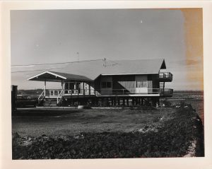 A vintage photograph of the KGY Studios overlooking the water. 