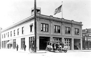 black and white photos of the firehouse building on State Avenue in 1912