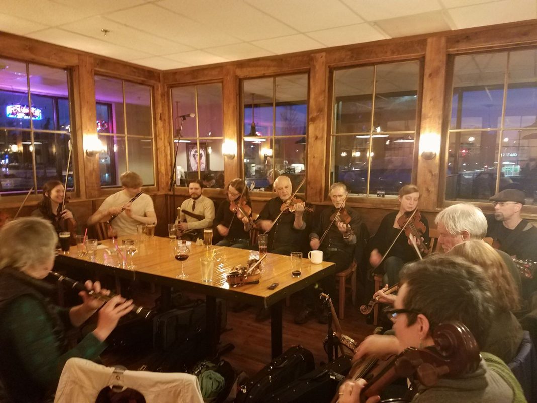 people sitting at a table at the Olympia Irish Weekend 2018