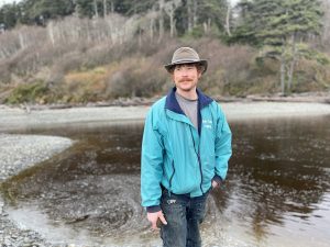 Josh Fletcher standing at Ruby Beach