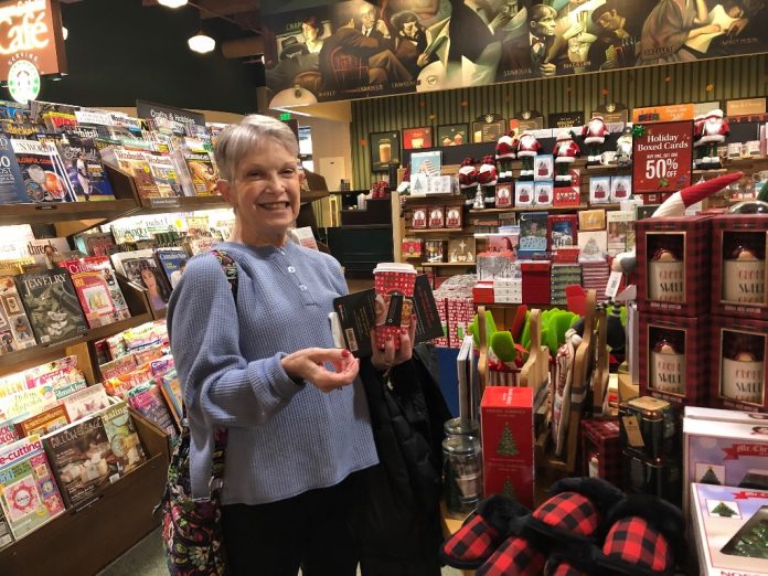 Fern Ridout looking at things for sale at Barnes & Noble books