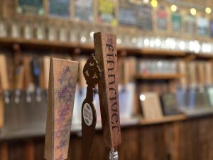 up close photo of a wooden tap at Finnriver Farm & Cidery 