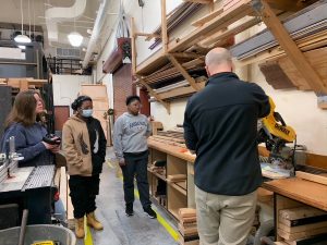 SPSCC students working with wood for set design