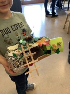 child holding a handmade Leprechaun trap from the Hands On Children's Museum