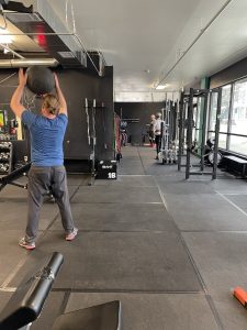 a man working out in a gym in Olympia