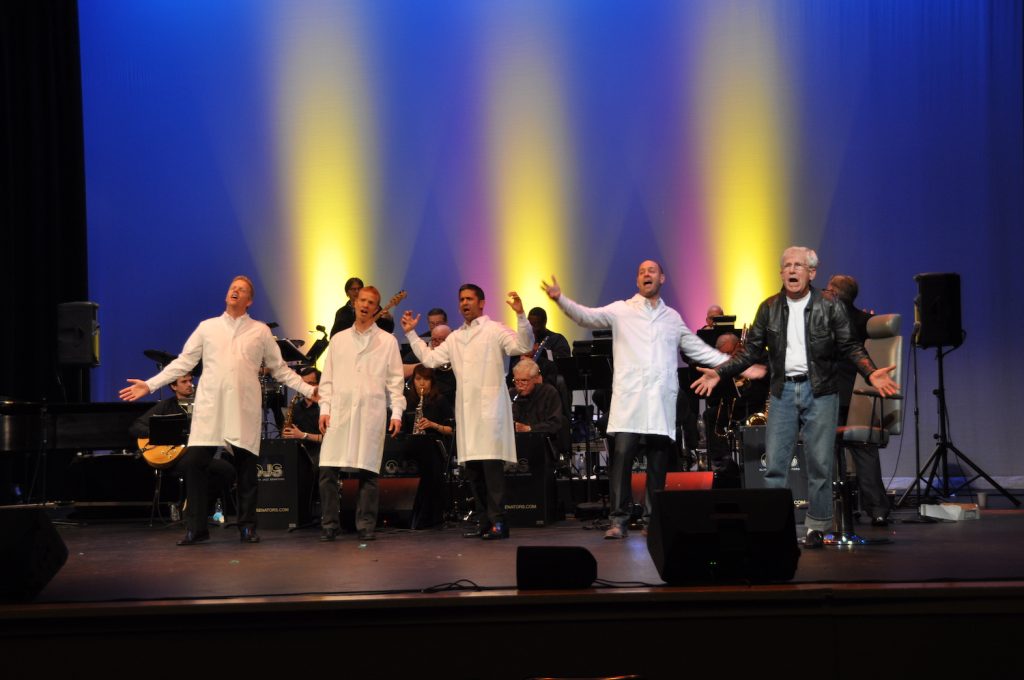 Dental Benefit Show is put on at the Washington Center for the Performing Art with dentists singing on stage