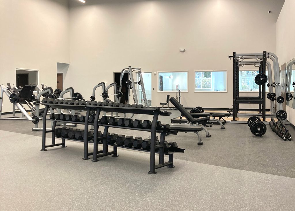 Steamboat Tennis & Athletic Club strength training room with weights, dumbbells and more