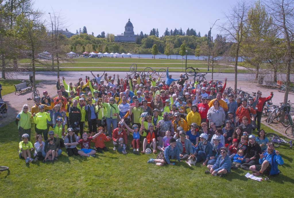 Large group photo of bike riders at Heritage Park