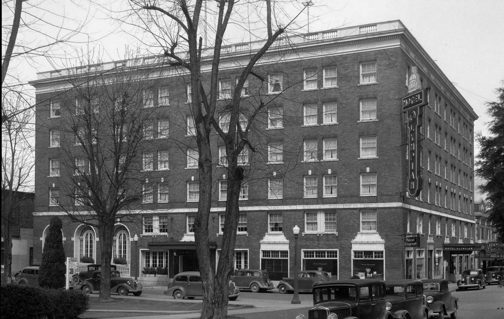 black and white photo of the Hotel Olympian building