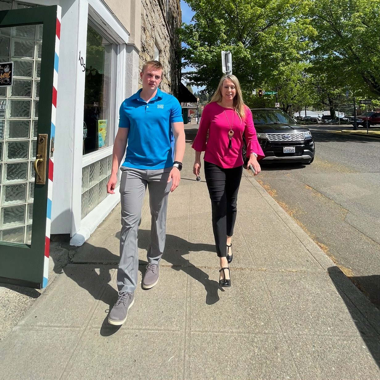 Scott Gunther and Carrie Whisler walking down the sidewalk in Centralia