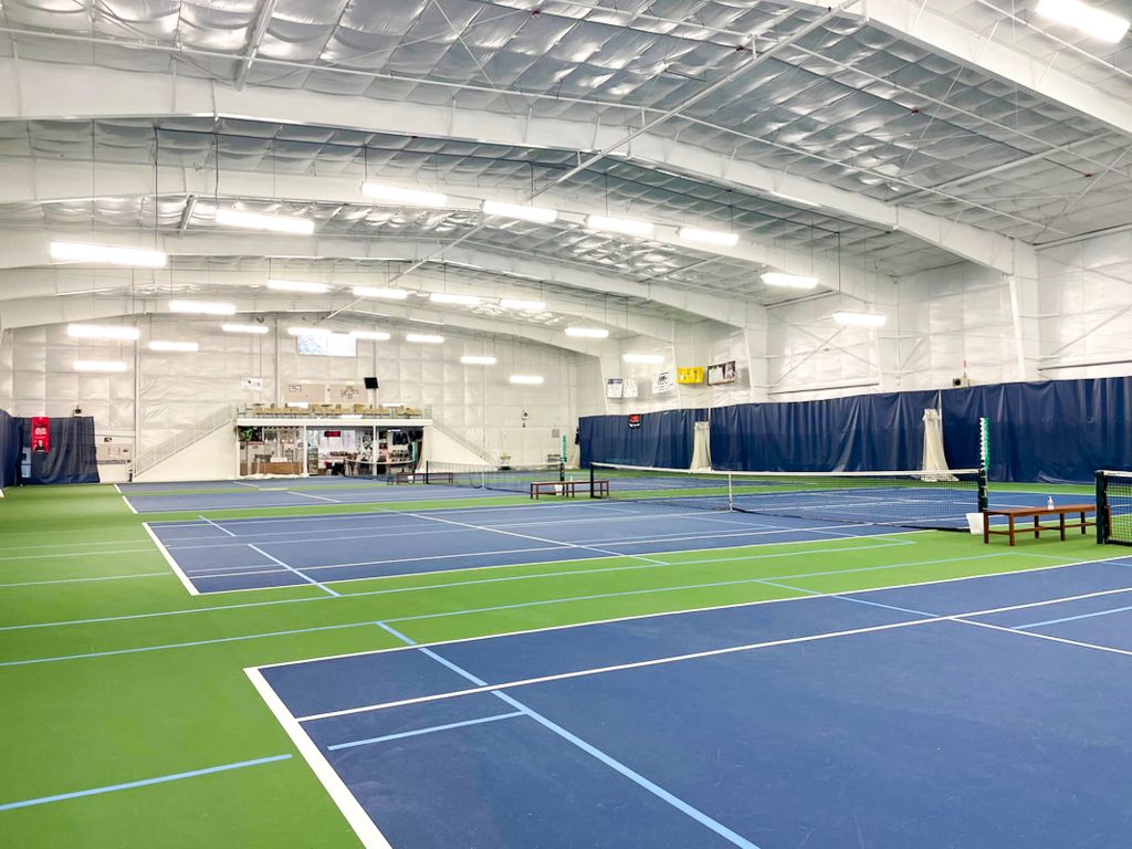 empty indoor tennis courts at Steamboat Tennis and Athletic Club