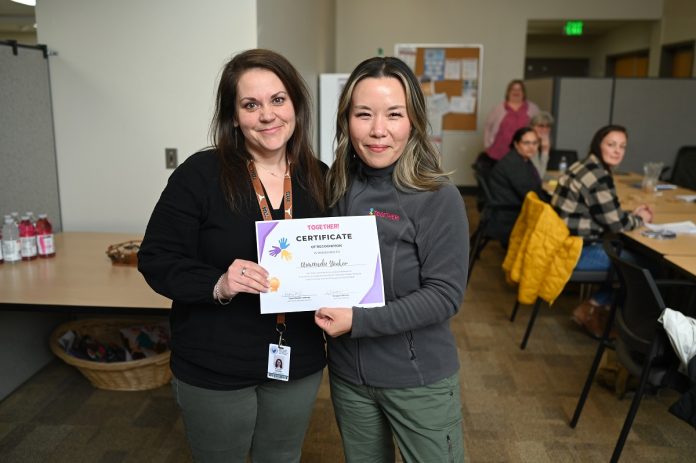 TOGETHER HH Tami awards NTPS Family navigator Amanda Yonkers certificate 2023-04-19