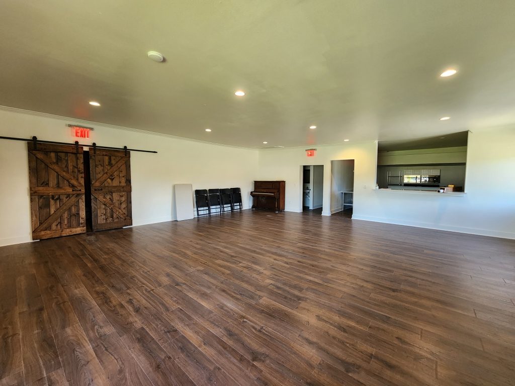 Empty room with wood floors