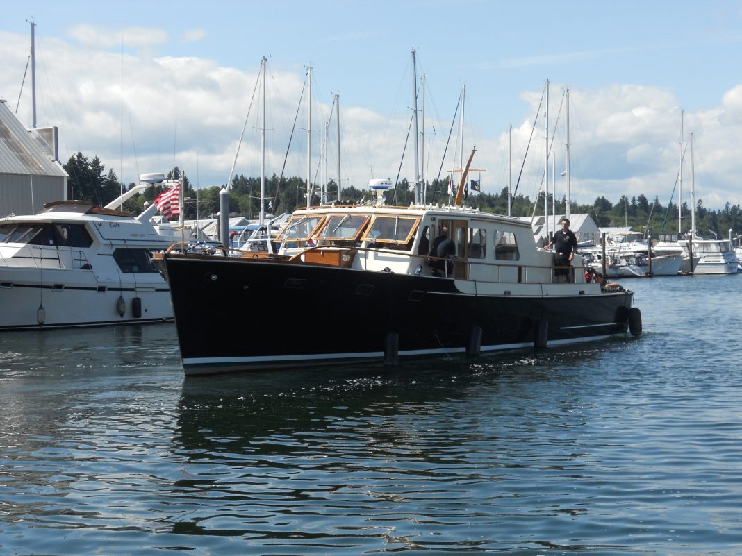 Navy Region Northwest Command Cutter OLD MAN IV boat in the water