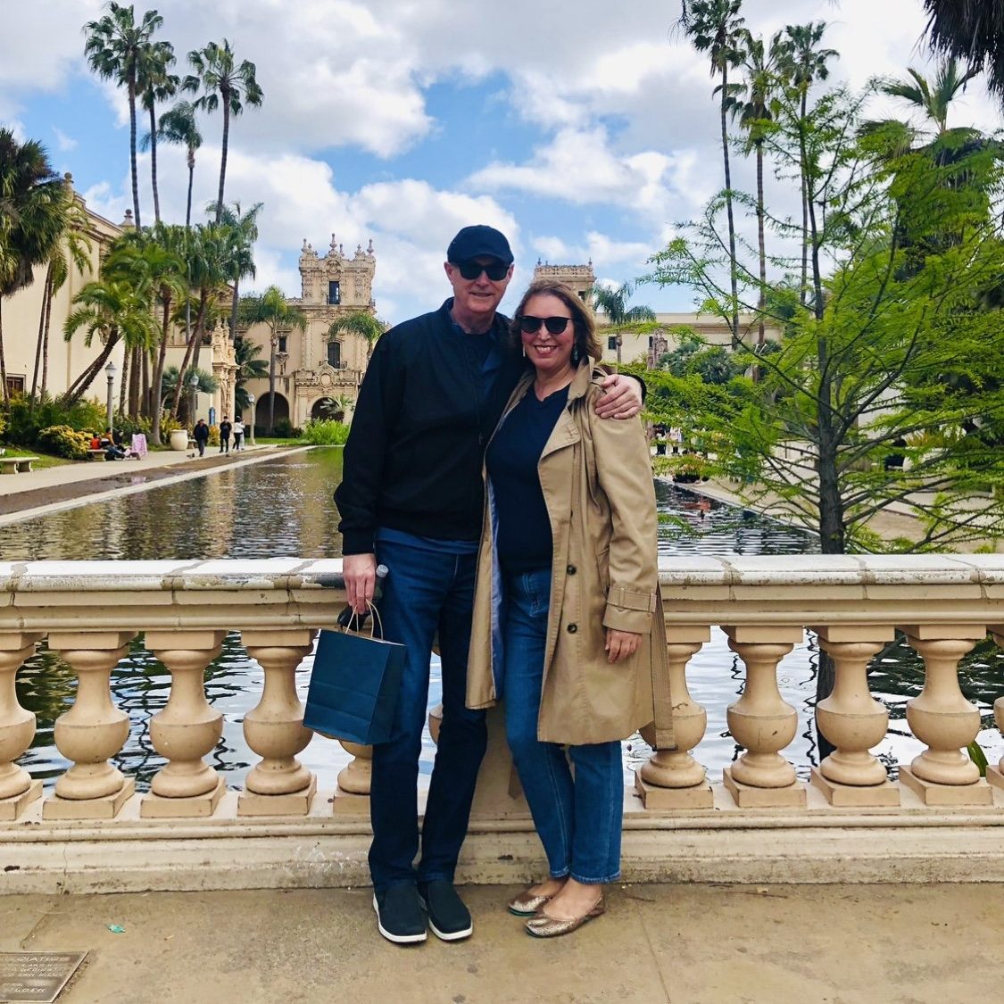 Sheryl and Larry Beck pose for a photo at Balboa Park in San Diego