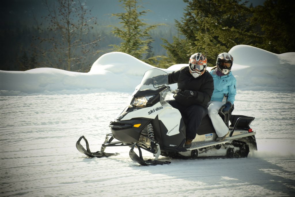 Dr. Iuliano on a snowmobile