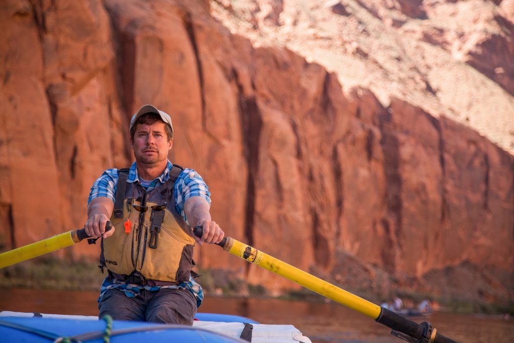 Kevin Fedarko rowing in the Colorado River in the Grand Canyon