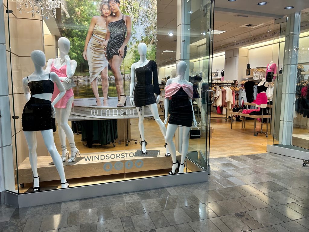 Windsor Store front in Capital Mall with homecoming dresses on mannequins