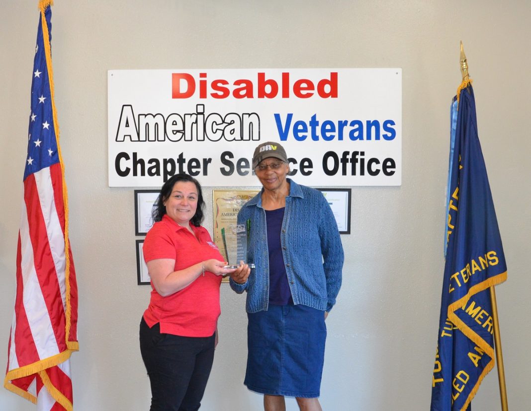 Patricia “Pat” Williams holding her DAV award with State Commander Cali Mullins