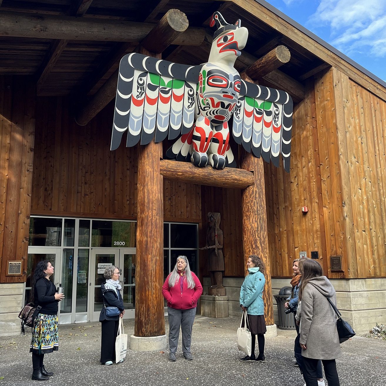 outside of the Squaxin Island Museum with people heading towards it