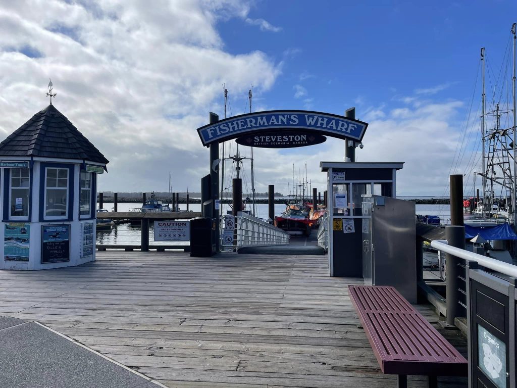 Steveston wharf with a whale-watching business hut.