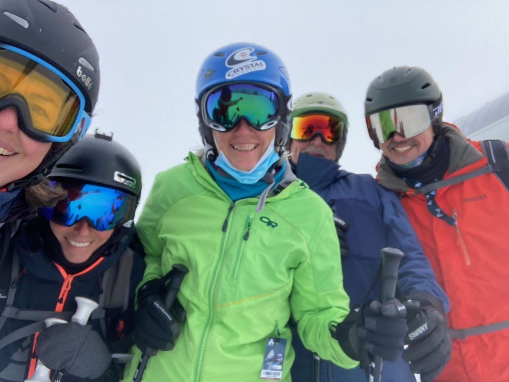 close up of a group of skiers posing for the camera