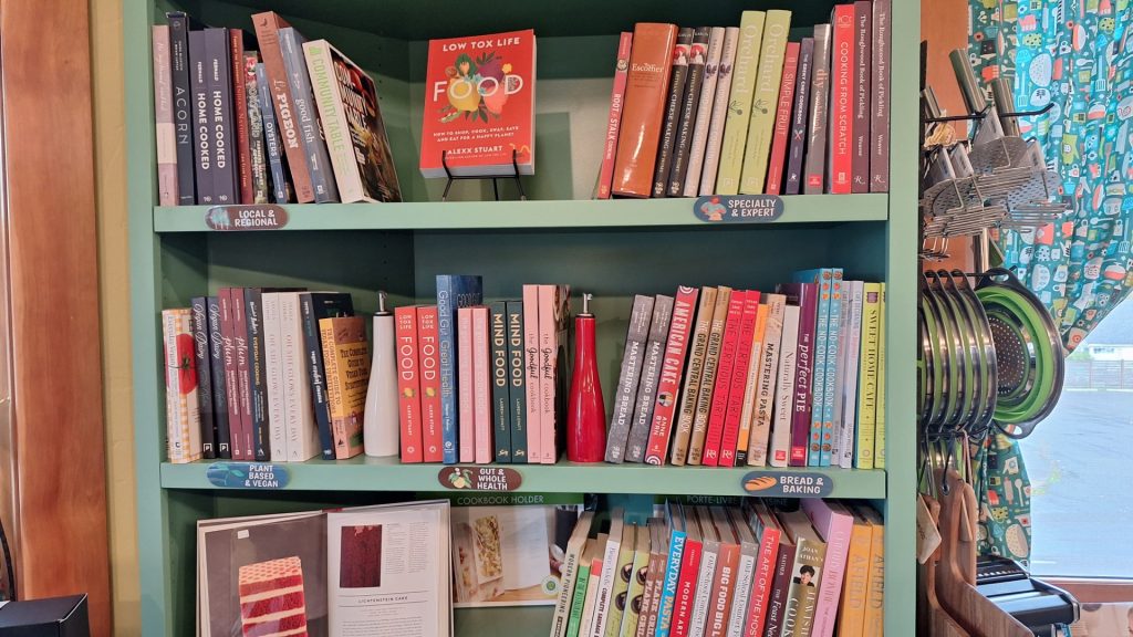 Cook books on a bookshelf at The Rolling Pin