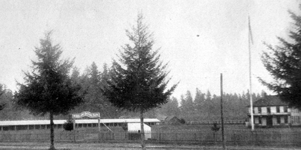 black and white photo of the Lacey racetrack from far away, in 1930