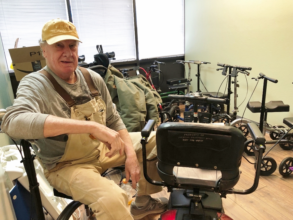 Denny Steidle sitting in a mobility scooter