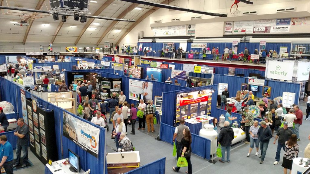 The Olympia Master Builders BIG Home & Remodel Show from the Marcus Pavilion Mezzanine. Lots of people milling around different booths