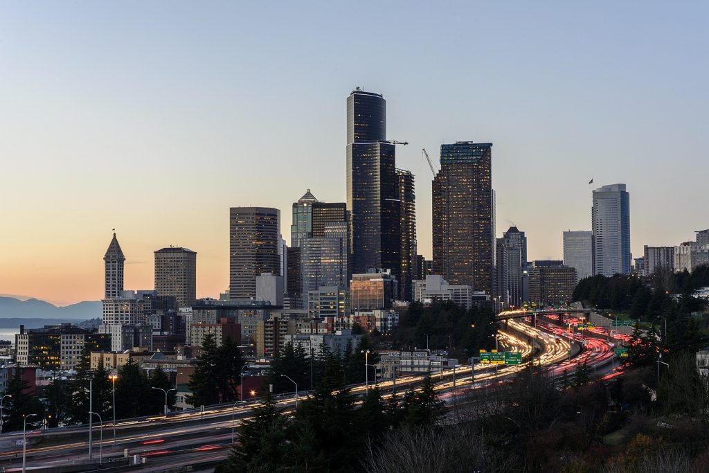 seattle, washington from far away with traffic on the freeway