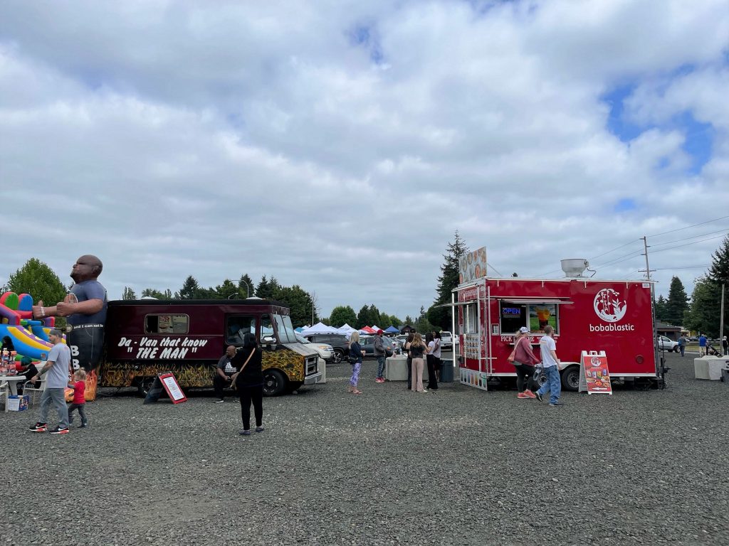 Food Trucks lined up in a gravel area