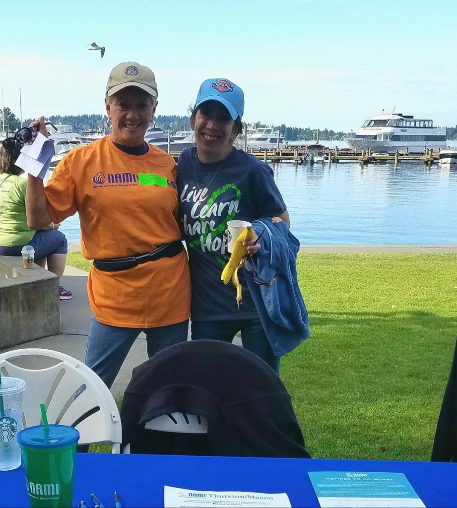 two people hugging at a NAMIWalks event