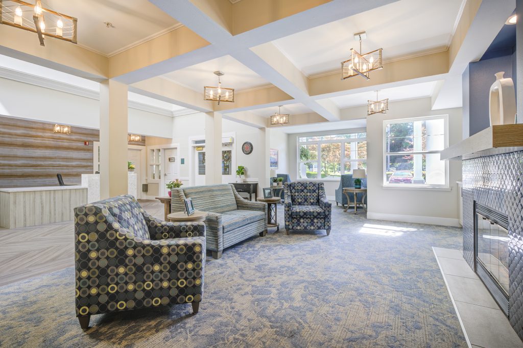 big living room type space with sofas and comfy chairs