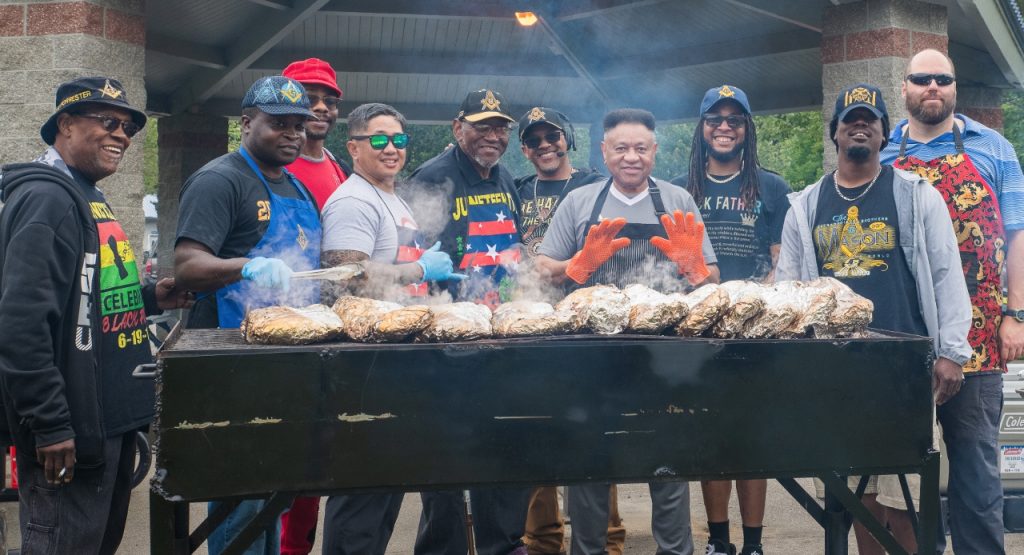 Fred U. Harris Masonic Lodge #70 PHA team standing behind a large grill