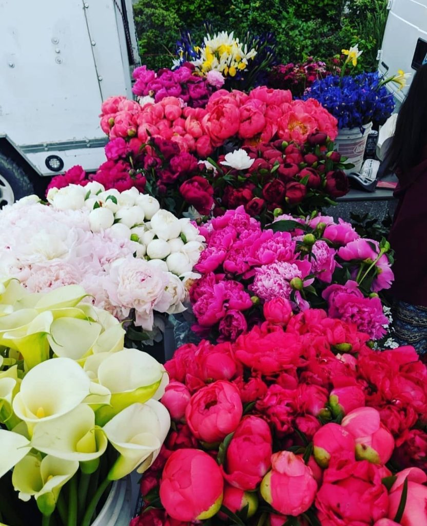 huge bunches of flowers of all kinds and colors at the Tuwmater Farmers Market