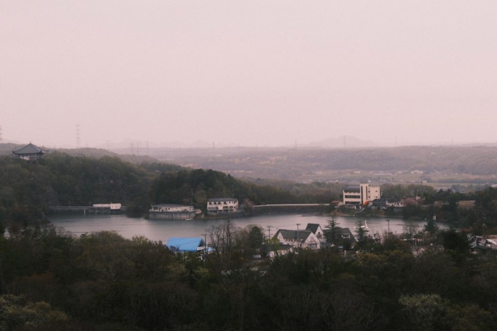 Kato, Japan skyline with hills, trees and a temple in the distance