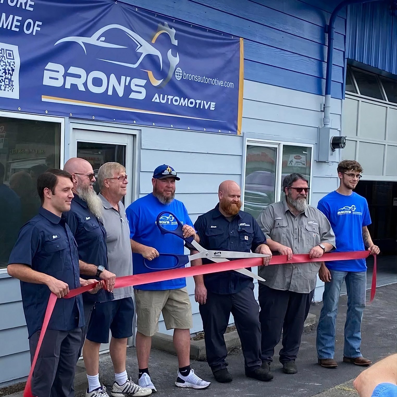 Bron's Automotive employees at a ribbon cutting for new location in Olympia