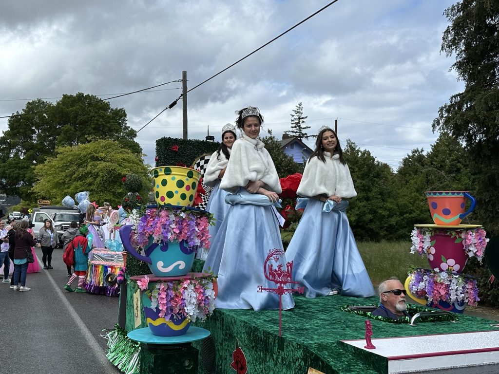 Capital Lakefair court on a parade float in Olympia