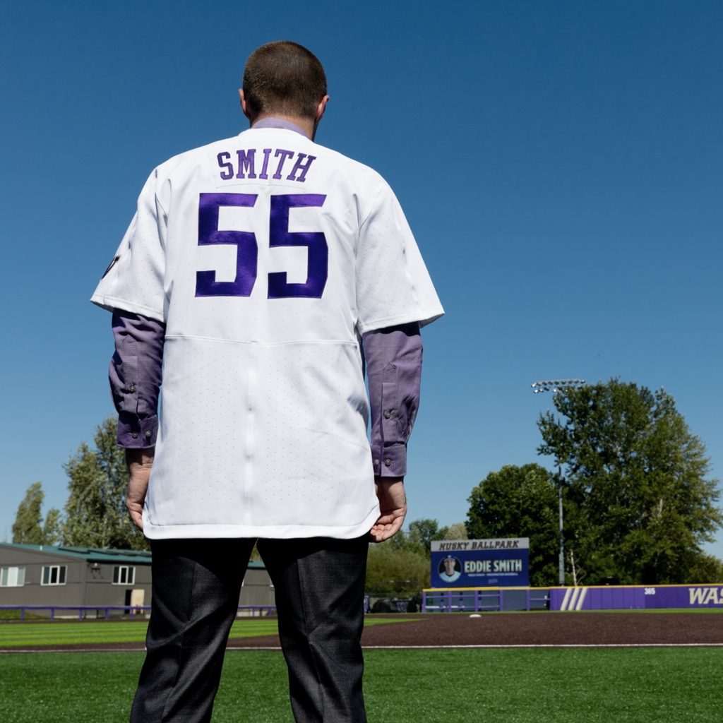 Eddie Smith on a baseball field in a baseball jersey with the number '55' on the back