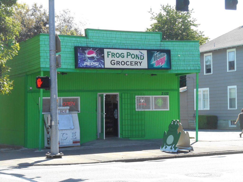bright green Frog Pond Grocery building