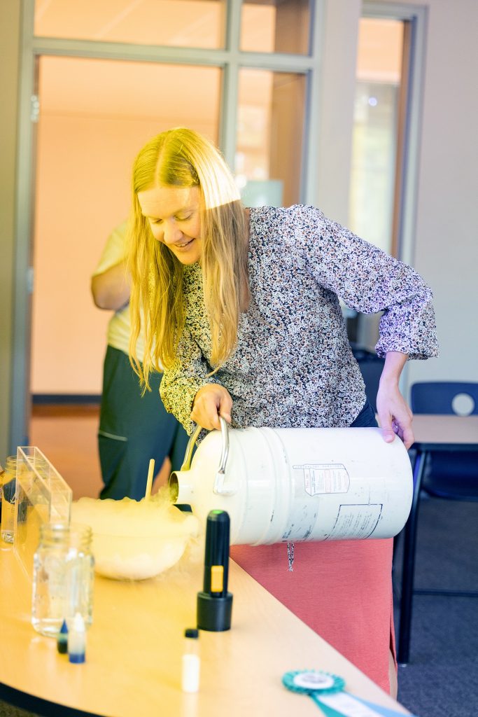 Reunion weekend 2024, alumni took classes in Harned Hall Andrea Kunder presenting the joy of nitrogen infused ice cream 