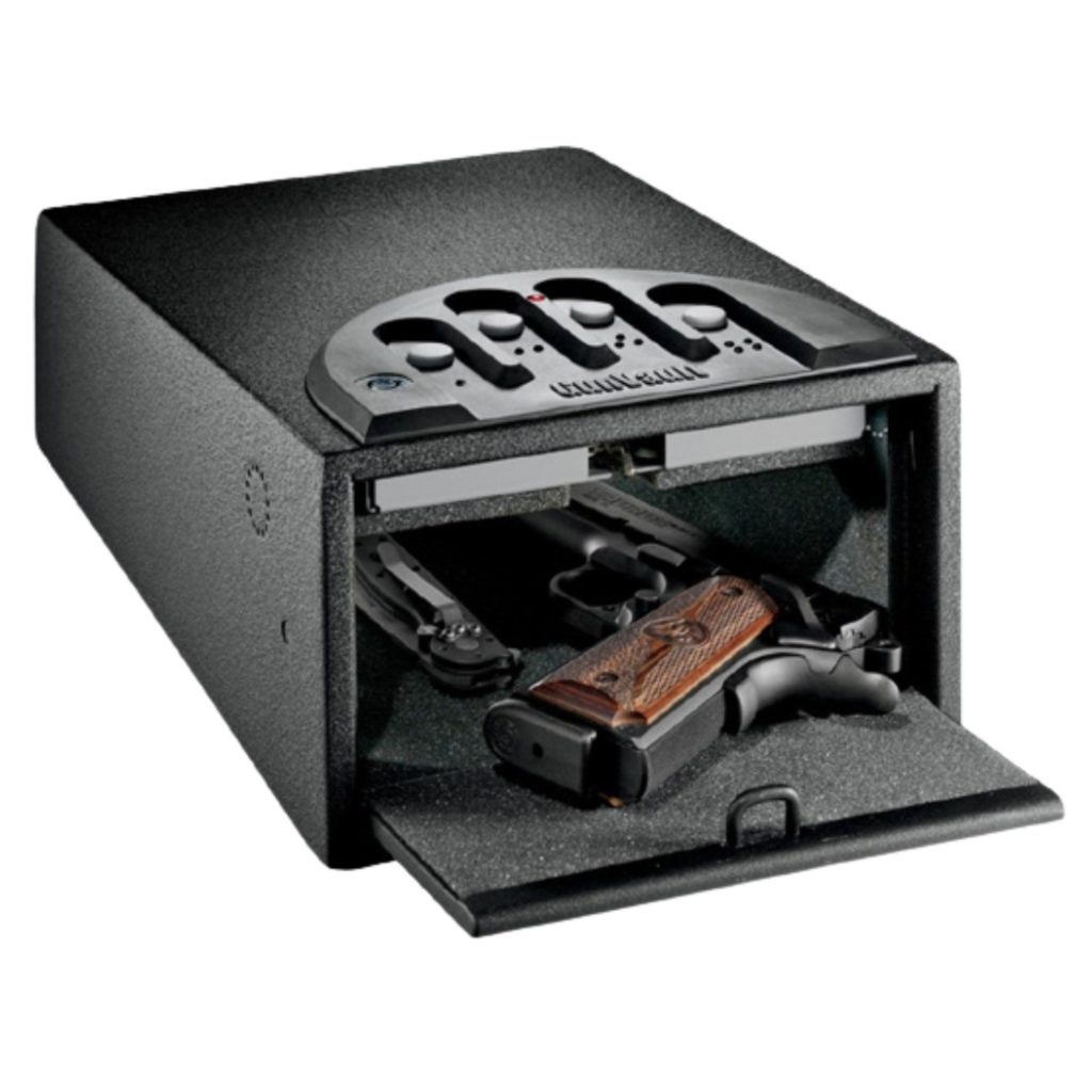 a small gun safe with a gun inside against a white background